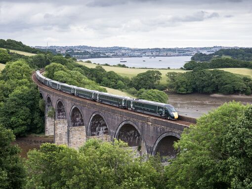 A South West trains drives over an old roman bridge in England