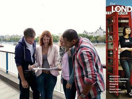 Group of people looking at the London Map