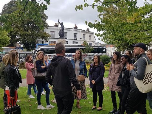 a_group_of_tourist_on_the_journey_through_the_winchester_past_walking_tour