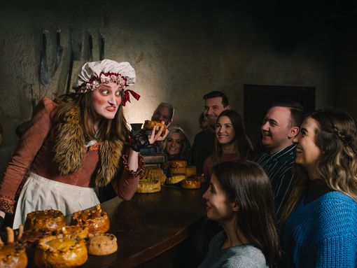 Mrs Lovett at her pie shop with guests at London Dungeon