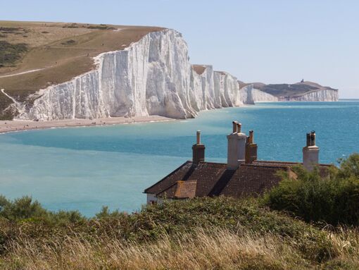 View of the Seven Sisters and Belle Tout Lighthouse from Cuckmere Haven South Downs in East Sussex