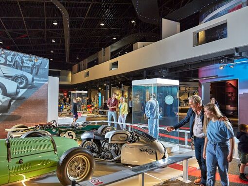Guests looking at a car at the Silverstone Museum