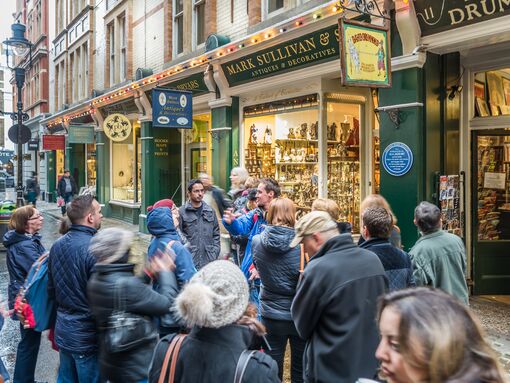 Tour group walking around Cecil Court