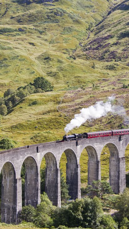 Jacobite steam train crossing Glenfinnan Viaduct