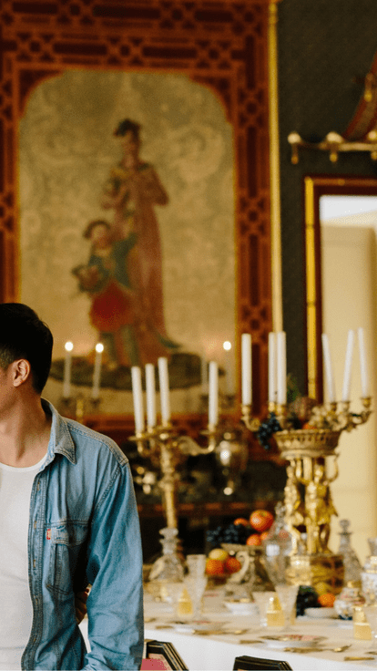 Couple visiting the State Banqueting Hall of a palace