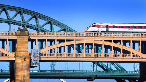 A train on a bridge near Newcastle you can access with BritRail England M-Pass