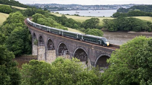 A South West trains drives over an old roman bridge in England