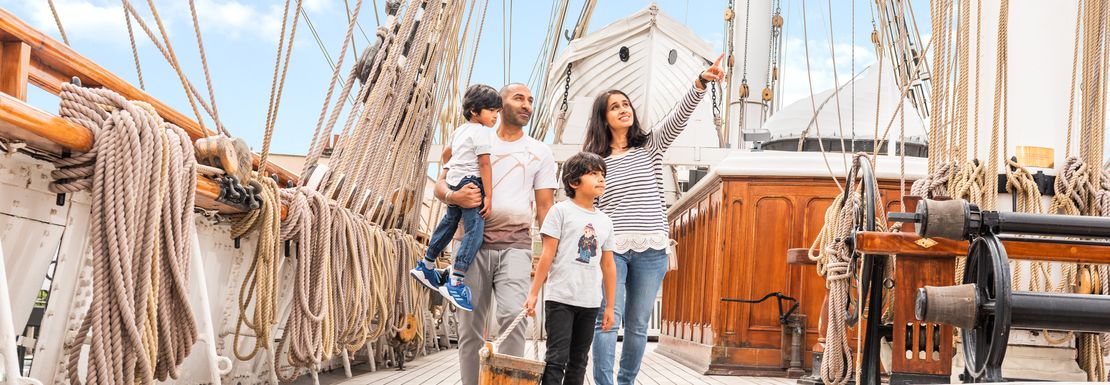 A family exploring the Cutty Sark