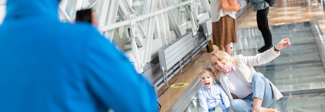 a_family_enjoying_the_glass_floor_on_top_of_the_Tower_Bridge