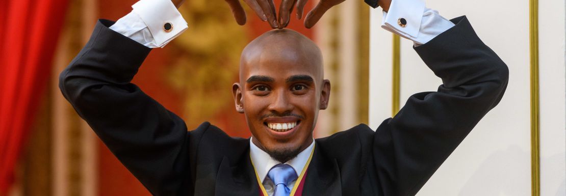 Mo Farah at Madame Tussauds dressed for the coronation