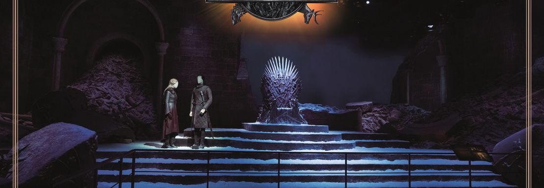 A set at the Game of Thrones showing snow on the steps in front of an empty throne