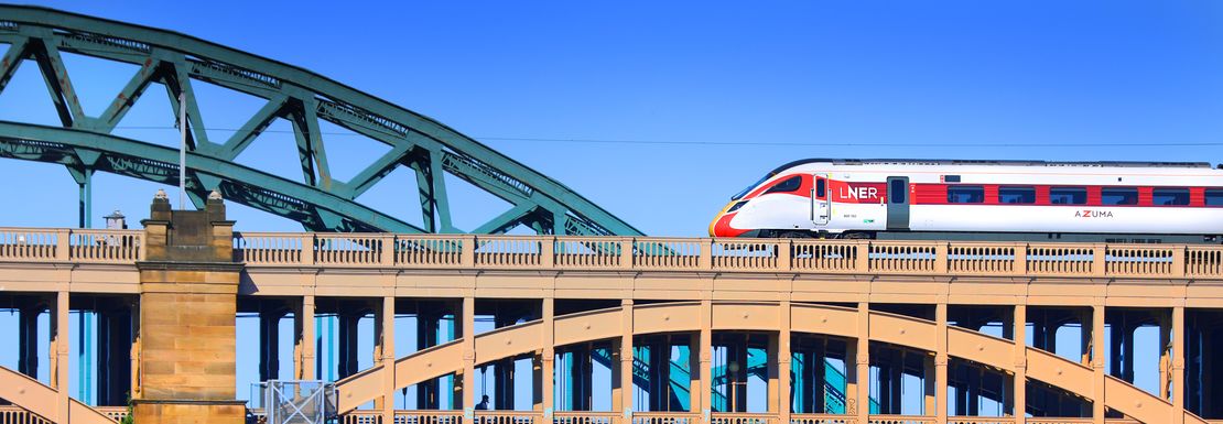 A train on a bridge near Newcastle you can access with BritRail England M-Pass