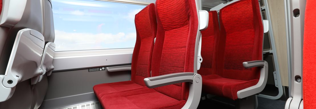 Comfortable seats inside a LNER London Northern Eastern Railway train