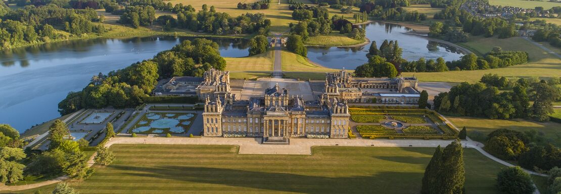 Blenheim Palace from a bird's eye view above looks down on the surrounding lakes