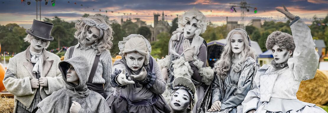 Scarefest people at Alton Towers in scary grey makeup for the visitors