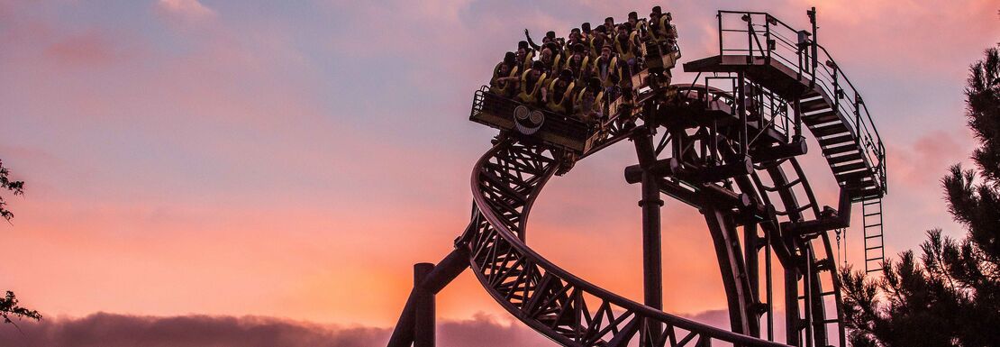 The Smiler ride at Alton Towers against a sunset background seems rather spooky