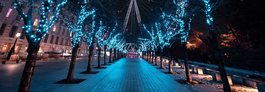 Blue Christmas lights set the scene in front of the London Eye