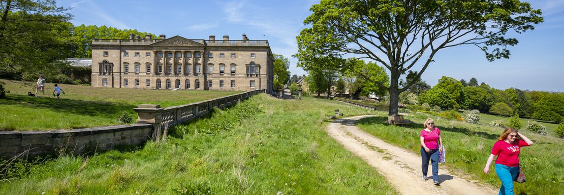 Visitors at Wentworth Castle Gardens on a sunny day in South Yorkshire