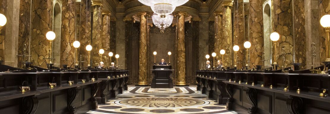 Gringotts Wizarding Bank in full splendor with a giant spherical chandalier