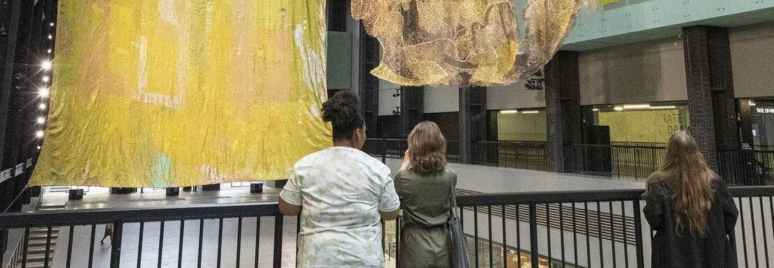 People look up at an art installation sponsored by Hyundai