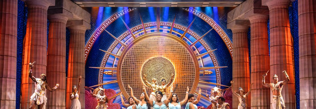Cast dancing in white