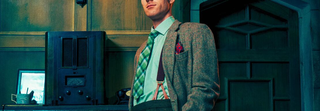Man with green tie