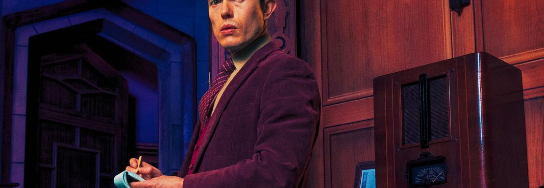 Man with burgundy jacket