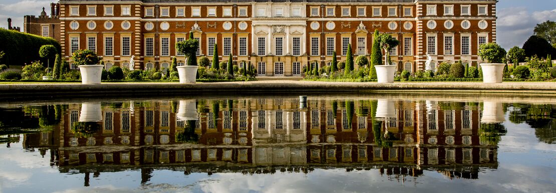 Hampton Court reflected in its moat
