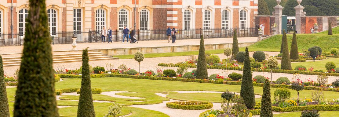 Manicured gardens outside Hampton Court