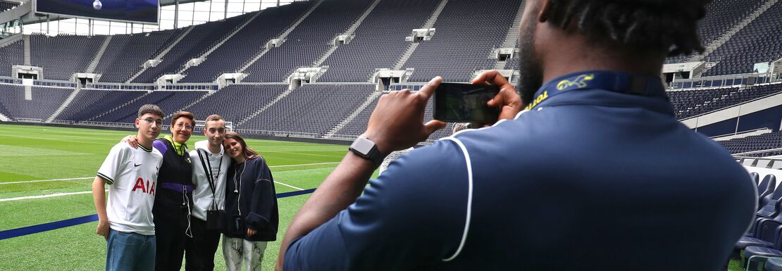 Taking photo of supporters on the Tottenham Hotspur Stadium Tour