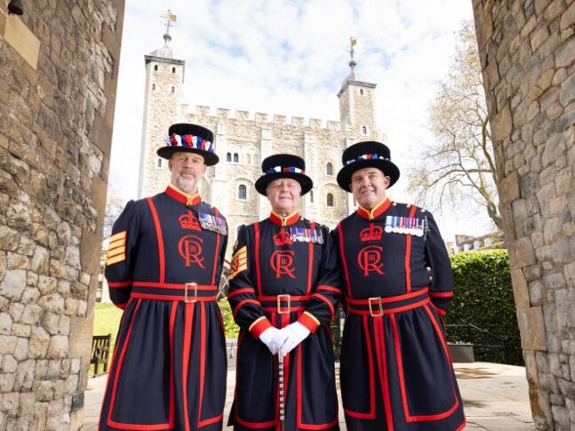 Three Yeoman Warders outside the Tower of London