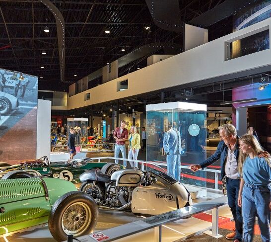 Guests looking at a car at the Silverstone Museum