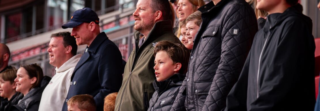 Football fans in the stands at Wembley Stadium