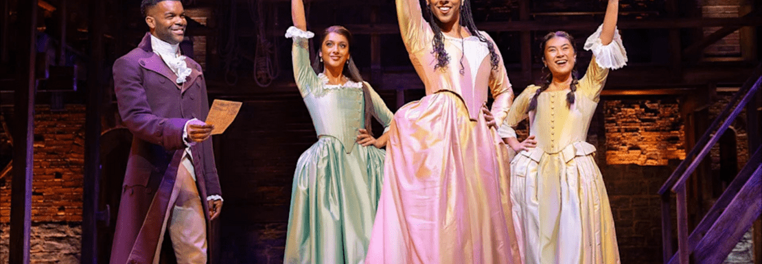 Actors portraying The "Schuyler Sisters" on stage in Hamilton